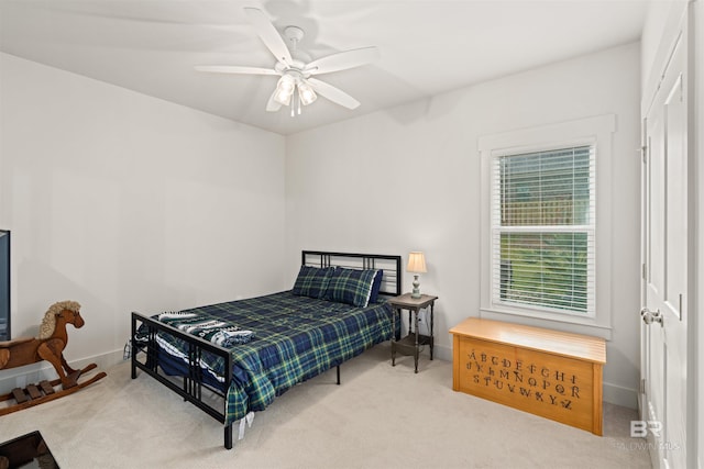 bedroom with carpet flooring and ceiling fan