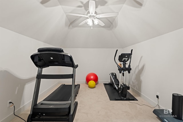 workout room with ceiling fan, light colored carpet, and vaulted ceiling