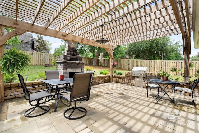 272 Chet Ave, Fairhope, AL 36532 - view of patio / terrace featuring outdoor dining space, an outdoor stone fireplace, and area for grilling