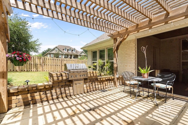 272 Chet Ave, Fairhope, AL 36532 - view of patio with area for grilling, fence, an outdoor kitchen, and a pergola