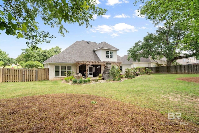272 Chet Ave, Fairhope, AL 36532 - back of property featuring a pergola, a shingled roof, brick siding, and a patio