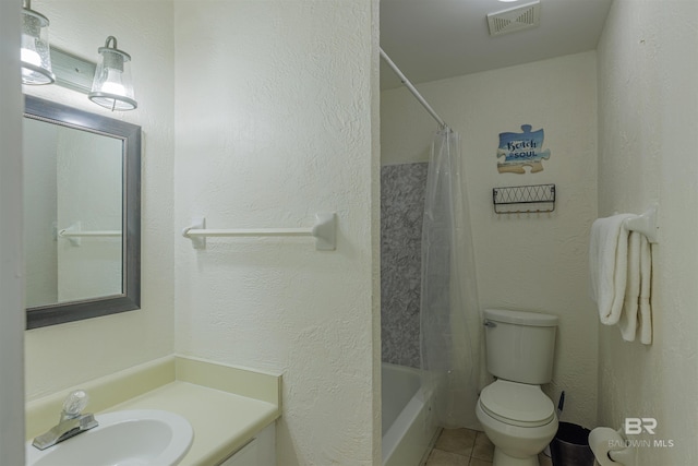 full bathroom featuring visible vents, a textured wall, toilet, tile patterned floors, and vanity