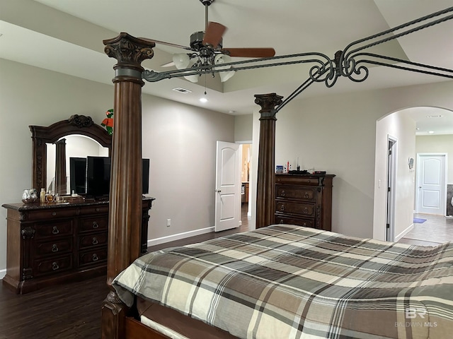 bedroom featuring ceiling fan and dark hardwood / wood-style floors