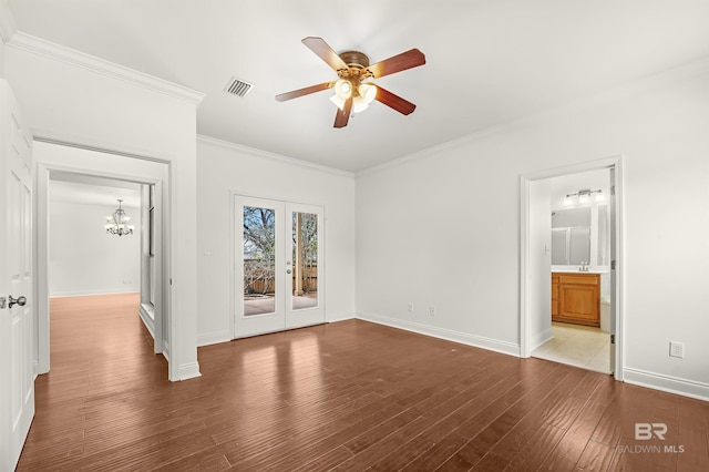 unfurnished bedroom with baseboards, access to outside, ornamental molding, and wood finished floors