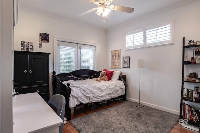 bedroom featuring crown molding, ceiling fan, and dark hardwood / wood-style floors