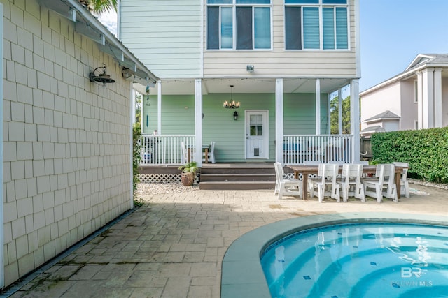 rear view of house featuring a patio area