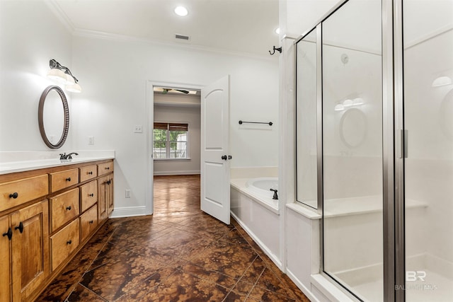 bathroom with vanity, ornamental molding, separate shower and tub, and tile patterned flooring