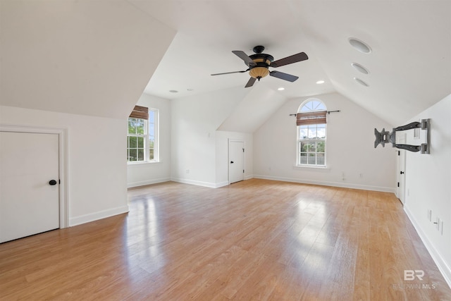 bonus room featuring vaulted ceiling, ceiling fan, and light hardwood / wood-style flooring