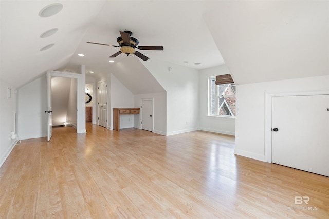 bonus room with ceiling fan, light hardwood / wood-style flooring, and lofted ceiling