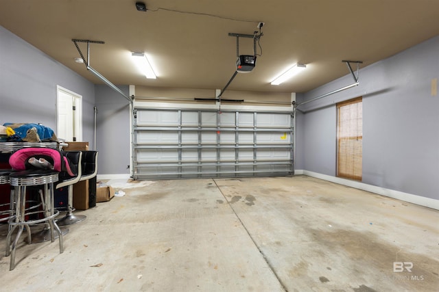 garage featuring a garage door opener