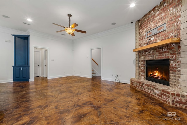 unfurnished living room with crown molding, ceiling fan, and a brick fireplace