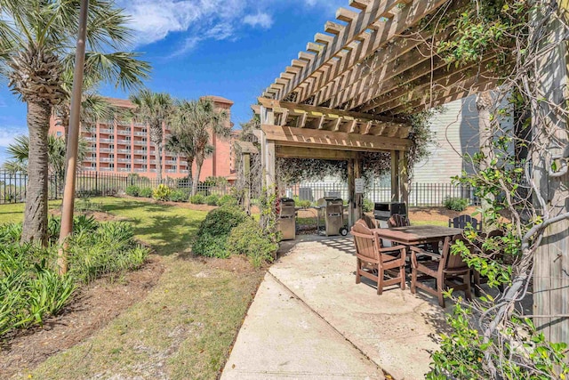 27284 Gulf Rd Unit 711, Orange Beach, AL 36561 - view of patio featuring outdoor dining area and a pergola