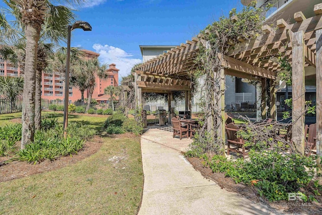 27284 Gulf Rd Unit 711, Orange Beach, AL 36561 - view of yard featuring a pergola and a patio area