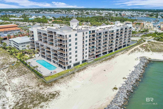 27284 Gulf Rd Unit 711, Orange Beach, AL 36561 - bird's eye view of apartment complex, a pool area, and a large body of water