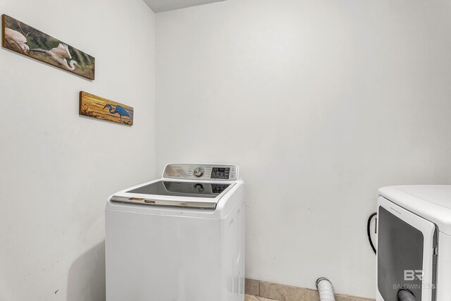 27284 Gulf Rd Unit 711, Orange Beach, AL 36561 - laundry area featuring washer and dryer