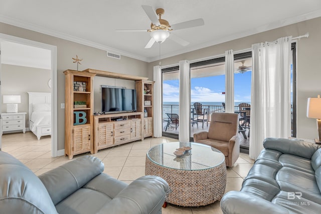 27284 Gulf Rd Unit 711, Orange Beach, AL 36561 - living area featuring a ceiling fan, light tile patterned floors, and crown molding