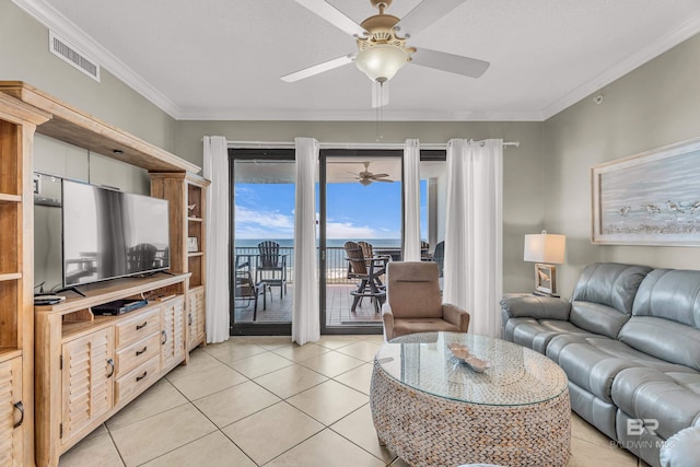 27284 Gulf Rd Unit 711, Orange Beach, AL 36561 - living room featuring ceiling fan, light tile patterned flooring, and ornamental molding