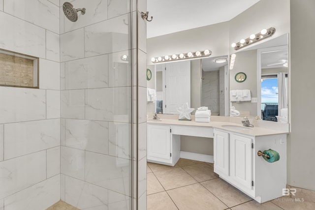 27284 Gulf Rd Unit 711, Orange Beach, AL 36561 - full bath featuring tiled shower, double vanity, and tile patterned flooring