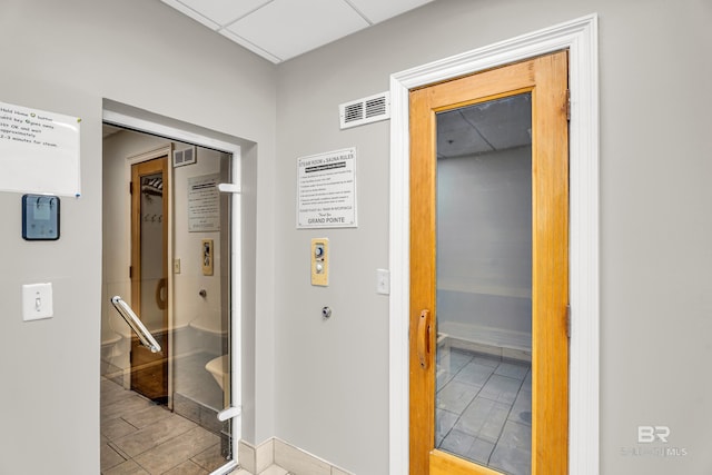 27284 Gulf Rd Unit 711, Orange Beach, AL 36561 - corridor featuring tile patterned flooring and baseboards