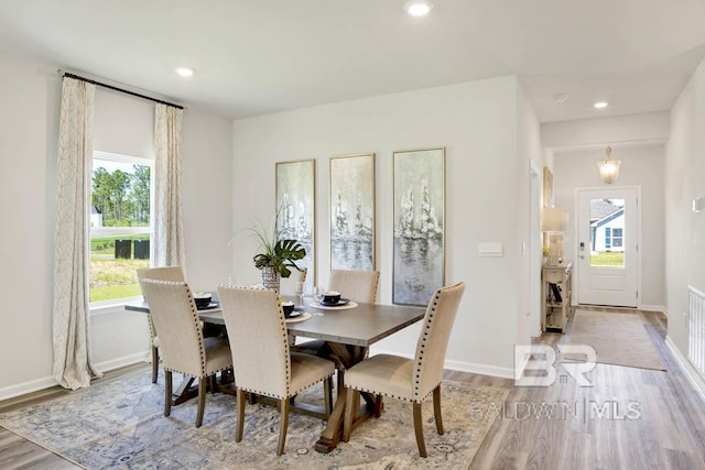 13440 Antler Hill Rd, Spanish Fort, AL 36527 - dining space featuring wood finished floors and recessed lighting
