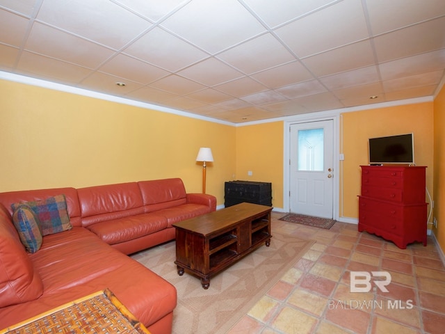 tiled living room with a drop ceiling