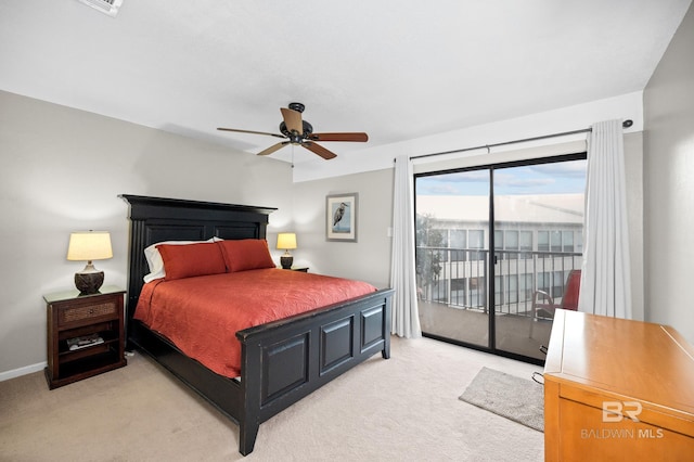 bedroom featuring access to outside, light colored carpet, and ceiling fan