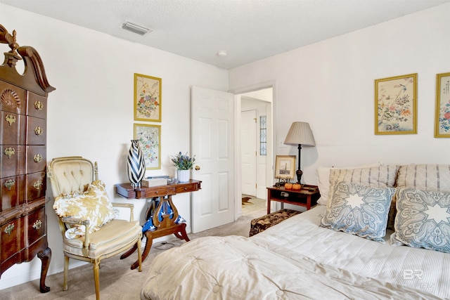 bedroom featuring light carpet