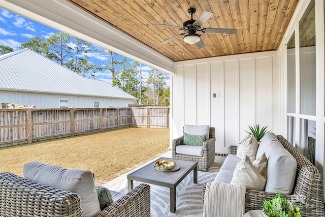 view of patio featuring an outdoor living space and ceiling fan