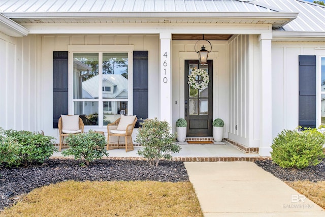 doorway to property with a porch