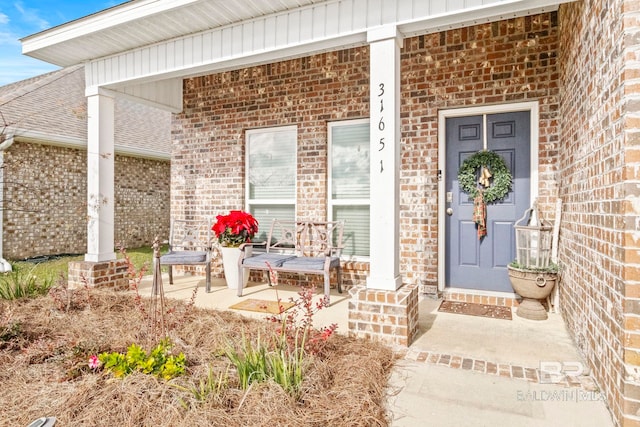 entrance to property with a porch