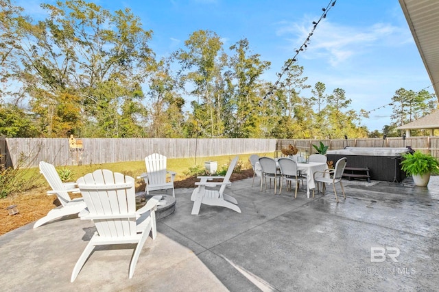 view of patio / terrace featuring a hot tub