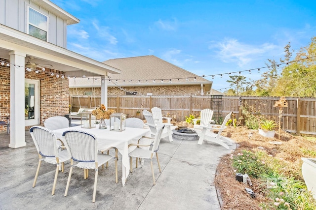 view of patio featuring an outdoor fire pit