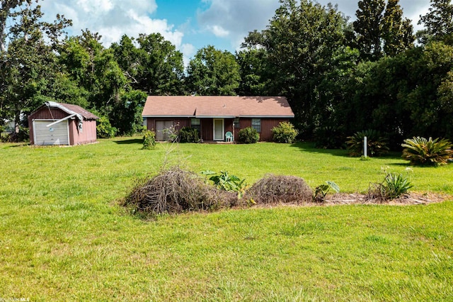 view of yard with an outdoor structure