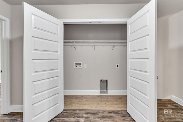 laundry area featuring washer hookup, dark hardwood / wood-style floors, and hookup for an electric dryer