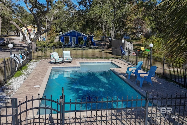 view of pool featuring a patio