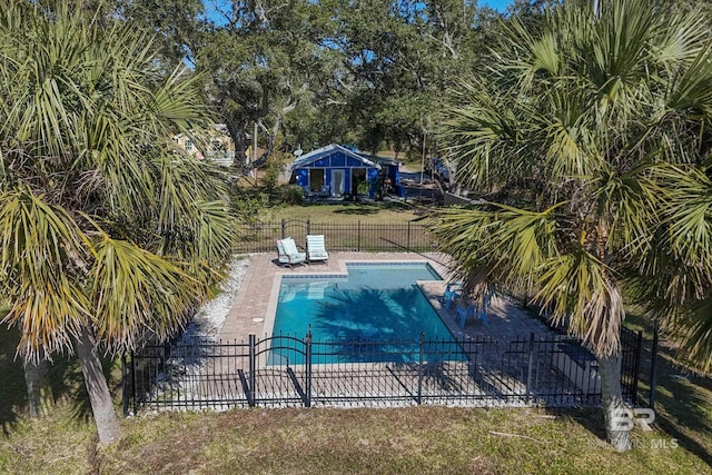 view of pool featuring a patio