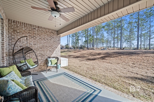 view of patio / terrace featuring ceiling fan