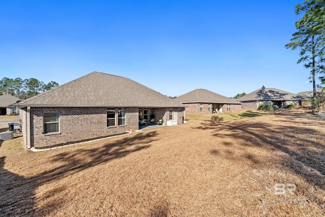 back of house with a patio area