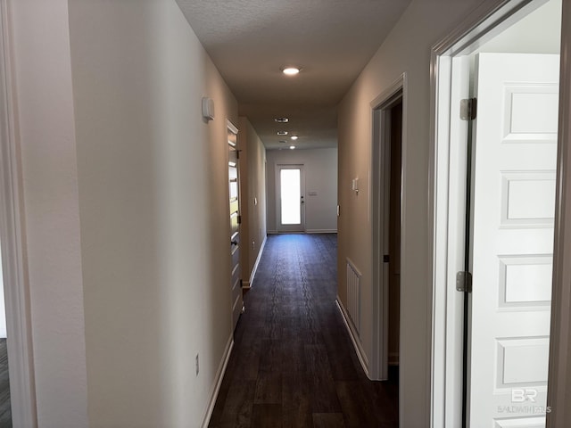 hall featuring dark hardwood / wood-style floors