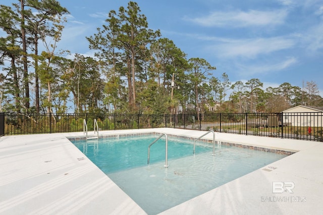 view of pool featuring fence and a fenced in pool