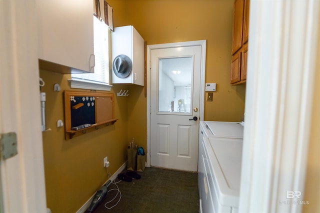 1619 Silver Creek Ct, Saraland, AL 36571 - laundry area with washing machine and clothes dryer, cabinet space, and dark carpet