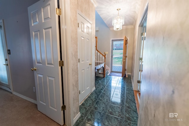 1619 Silver Creek Ct, Saraland, AL 36571 - hallway with a chandelier, stairway, and ornamental molding