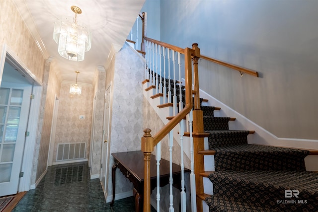 1619 Silver Creek Ct, Saraland, AL 36571 - staircase featuring a chandelier and crown molding