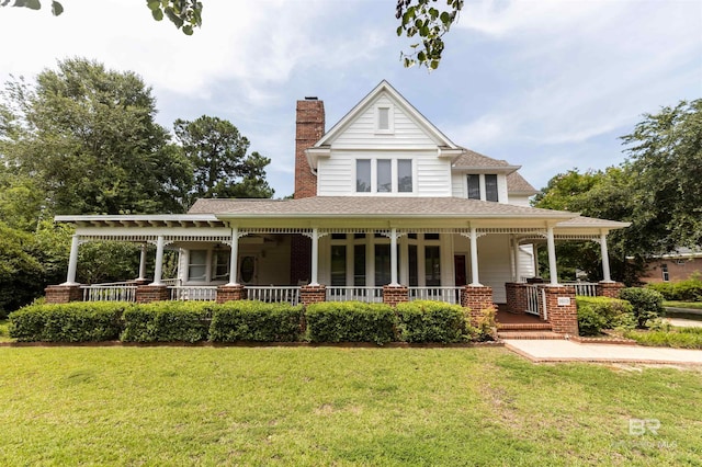 1619 Silver Creek Ct, Saraland, AL 36571 - view of front of property with a porch, a chimney, and a front yard