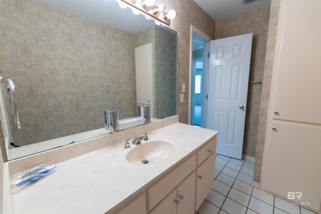 1619 Silver Creek Ct, Saraland, AL 36571 - bathroom featuring tile patterned floors, vanity, and wallpapered walls