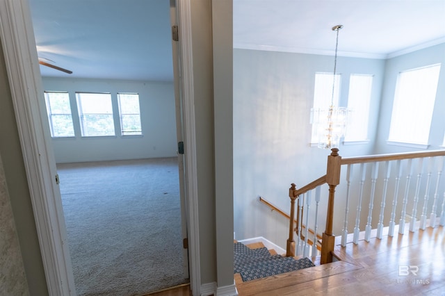 1619 Silver Creek Ct, Saraland, AL 36571 - stairs featuring a chandelier, ceiling fan, carpet floors, and crown molding