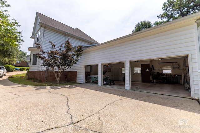 1619 Silver Creek Ct, Saraland, AL 36571 - view of side of property featuring concrete driveway and a shingled roof