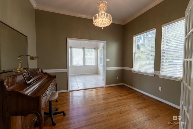 1619 Silver Creek Ct, Saraland, AL 36571 - office with wood finished floors, a chandelier, and ornamental molding