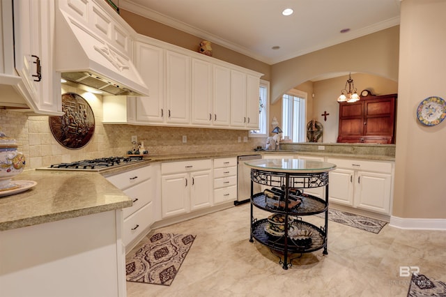 kitchen featuring white cabinets, crown molding, custom range hood, and stainless steel appliances