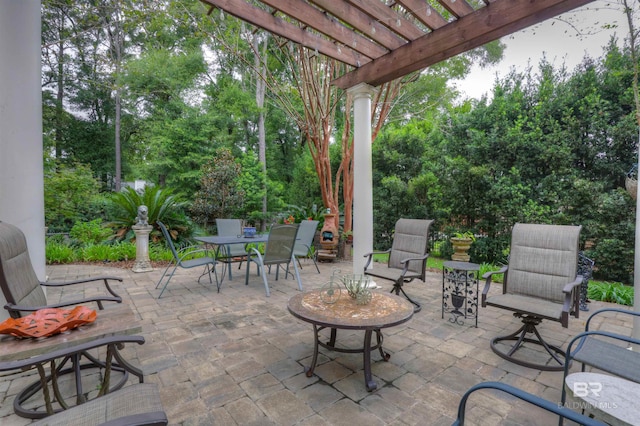 view of patio featuring a pergola